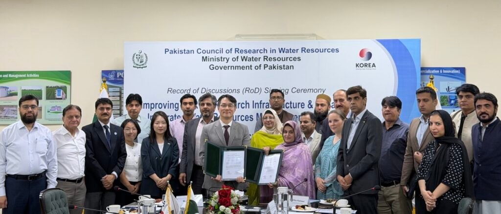 Officials attend the signing ceremony for the KOICA-funded water research and management project at PCRWR in Islamabad.