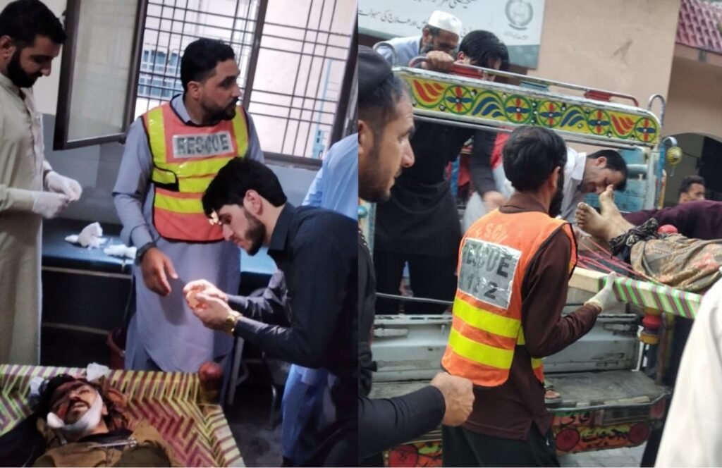 Rescue teams recover victims after a passenger tractor plunged into a ravine in Shangla district.