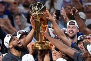 New York Knicks fans celebrate as the city opens a lottery for free Knicks championship ceremony tickets
