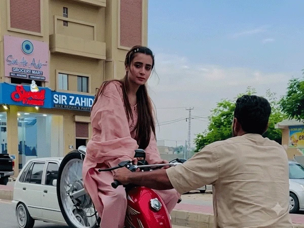 Dangerous Wheelie Video Featuring Young Woman Goes Viral in Islamabad Housing Society