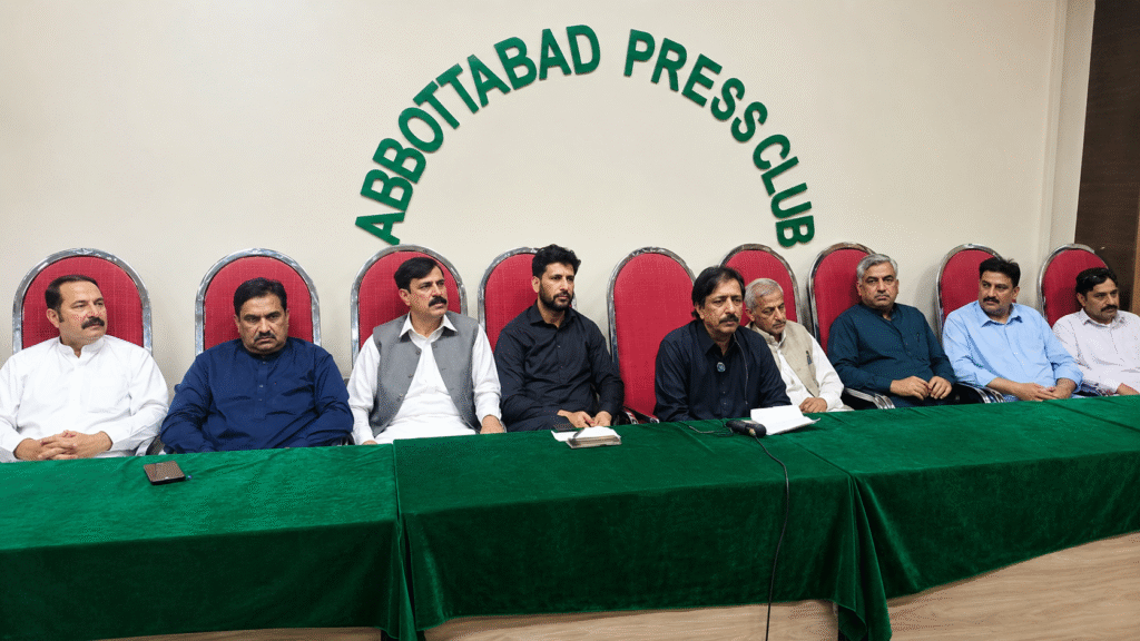 PPP workers address a press conference in Abbottabad regarding organizational issues within the party.