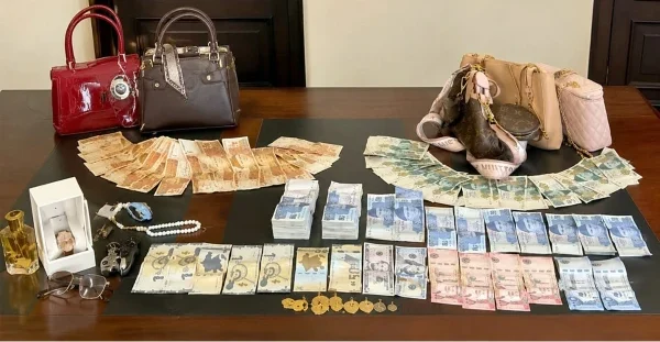 Rawalpindi: Domestic worker and brother arrested over Rs2.6 million theft case Rawalpindi police showing recovered cash, gold jewellery and foreign currency after arrest of domestic worker theft suspects.