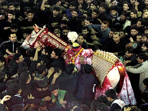 Karachi’s historic Muharram processions preserve old Zuljanah, alam and azadari traditions in the Bara Imam area.