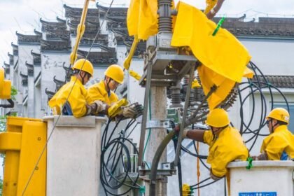 Residents gather in a renovated community space as China's urban renewal program improves neighborhoods and public facilities.