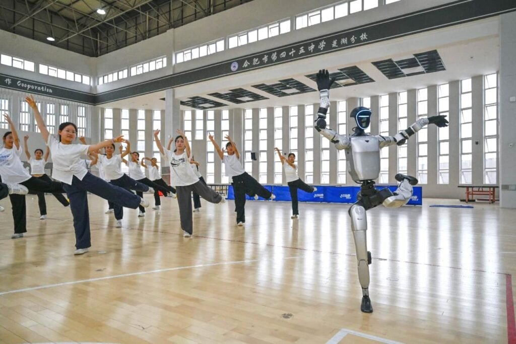 Why are Chinese robots both affordable and highly capable? A Chinese humanoid robot demonstrates advanced movement during a public performance, highlighting China's growing robotics industry.