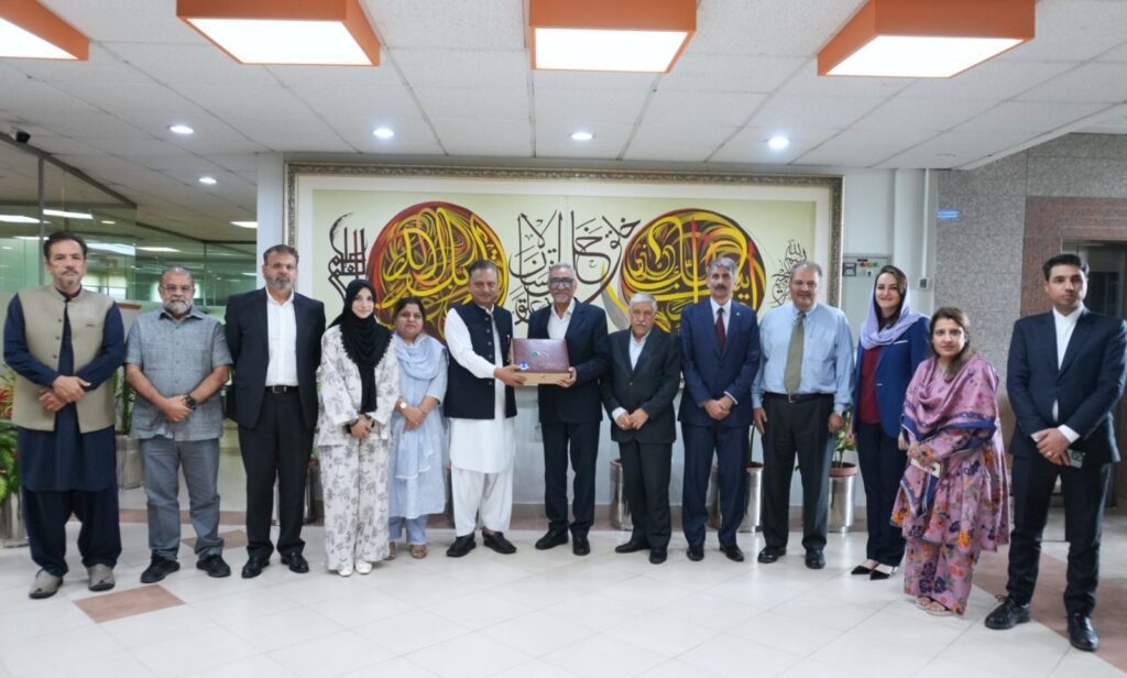 Iranian Ministry of Science delegation meeting COMSATS University Islamabad officials for academic and research cooperation.