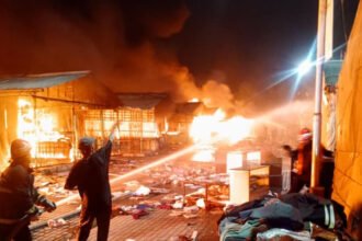 Damaged stalls at H-9 Market after the fire as officials investigate the cause and review fire safety measures.