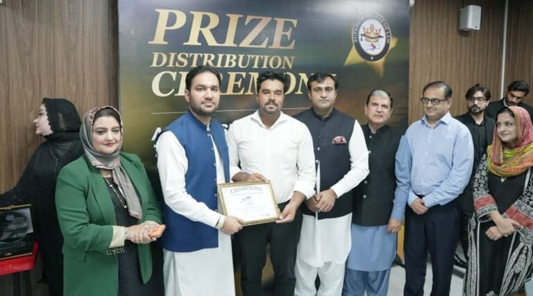 Punjab Minister Malik Faisal Ayub Khokhar distributes certificates to graduating students at Superior College of Law in Lahore.
