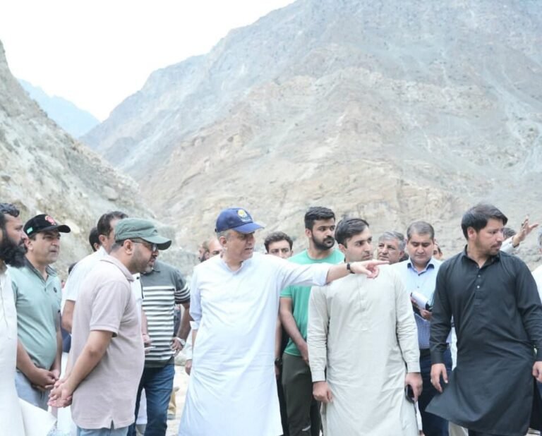 Federal Minister Abdul Aleem Khan inspecting flood damage on the Skardu-Gilgit Road after flash floods.