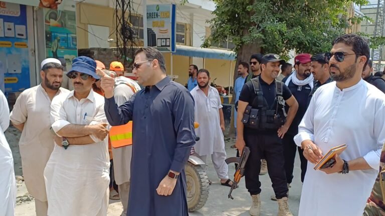 Mardan district administration conducting an anti-encroachment operation at Koragh Drain near Doshera Chowk.