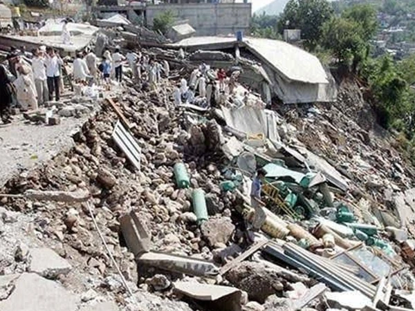 Excavation work in Balakot where the remains of a child missing since the 2005 Kashmir earthquake were discovered.