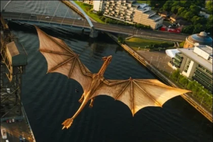 The Syrax dragon flying over Glasgow above the River Clyde ahead of the 2026 Commonwealth Games.