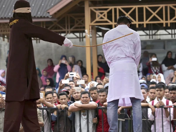 Indonesia unmarried couple publicly caned after TikTok live video goes viral