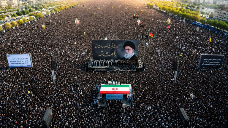 Crowds gather during Ali Khamenei’s funeral processions in Iran as state media claims millions attended the ceremonies.