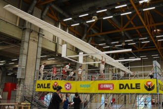 The world's largest paper airplane, built by Italian students, during its Guinness World Records flight attempt.