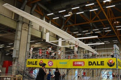 The world's largest paper airplane, built by Italian students, during its Guinness World Records flight attempt.