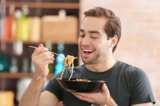 A plate of fried food tempting a person despite being full