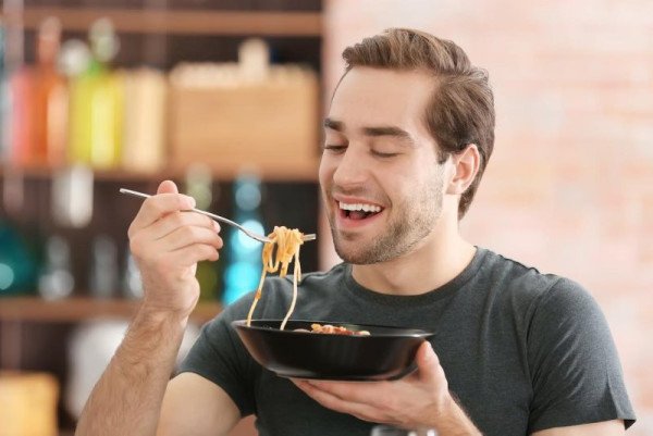 A plate of fried food tempting a person despite being full
