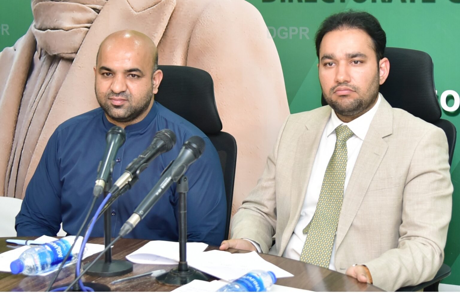 Punjab ministers Rana Sikandar Hayat and Malik Faisal Ayub Khokhar address a joint press conference in Lahore.