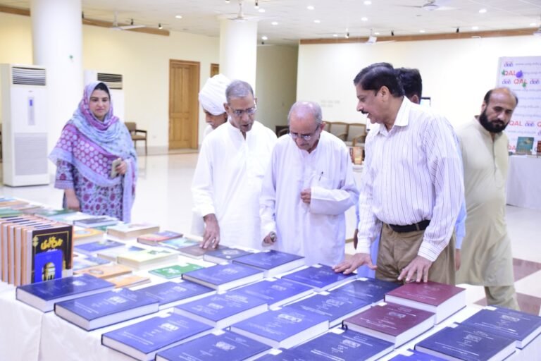 A literary delegation from Kunjah visits the Seerah exhibition at the University of Gujrat’s Quaid-e-Azam Library.