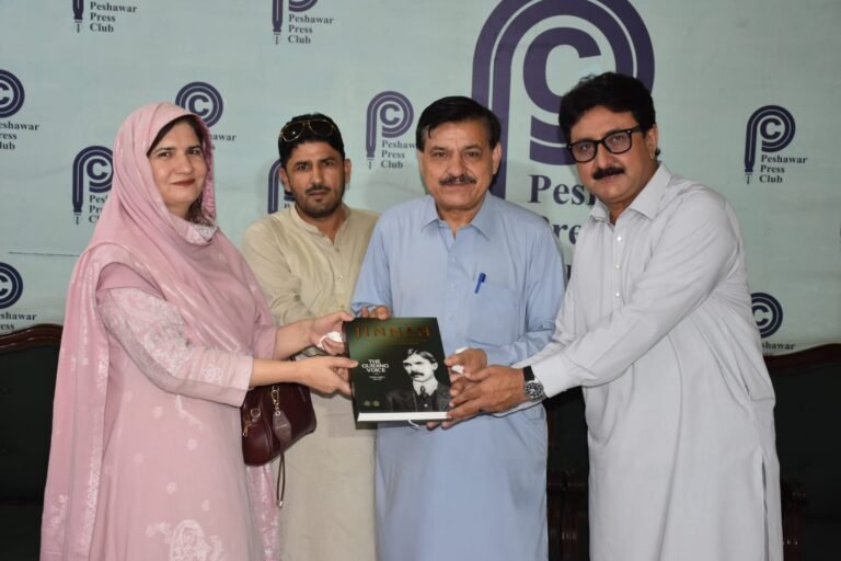 PID Peshawar Deputy Director Romana Asad Khan presents a historical collection of Quaid-e-Azam's speeches to Peshawar Press Club officials.