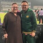 Mike Hesson poses with his father during the Pakistan-England match at Gaddafi Stadium.
