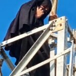 A 19-year-old woman reportedly climbs a 100-foot mobile tower in Uttar Pradesh before coming down after an online nikah.