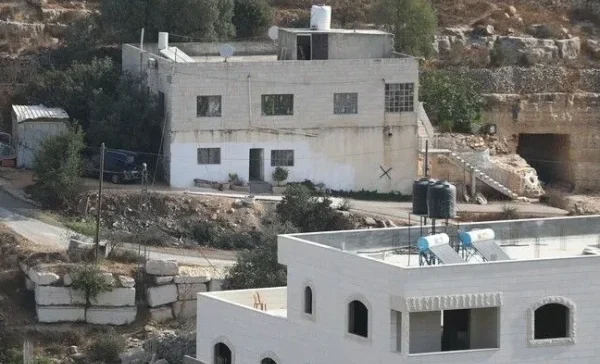 Israeli soldiers conduct military operations in Hebron in the occupied West Bank, where Palestinian homes have reportedly been converted into military posts.