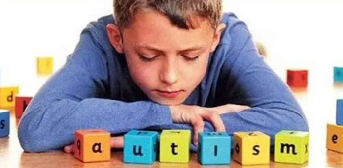Children with autism participate in educational and developmental activities at a school in Karachi.
