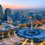 Panoramic view of Kazakhstan's vast steppes and modern Astana skyline, reflecting the country's journey from nomadic heritage to contemporary development.