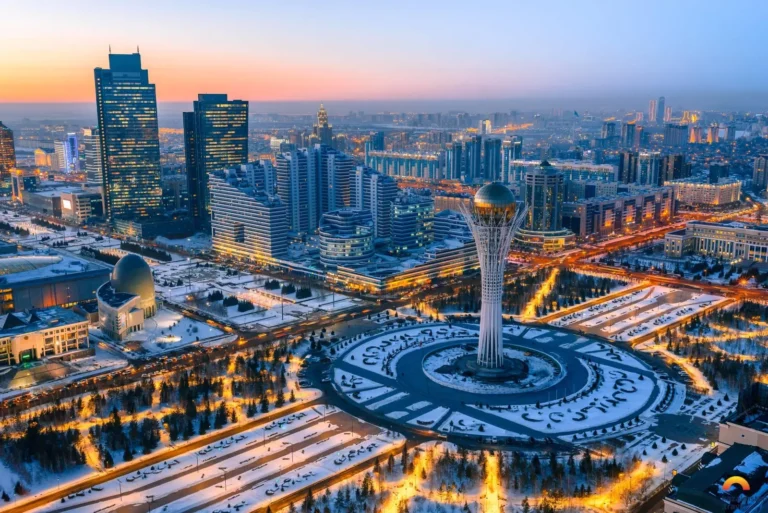 Panoramic view of Kazakhstan's vast steppes and modern Astana skyline, reflecting the country's journey from nomadic heritage to contemporary development.