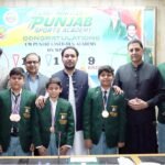 Punjab Sports Minister Malik Faisal Ayub Khokhar honours CM Punjab Laser Run Academy athletes after their 11-medal success at Global Laser Run competitions in Thailand.