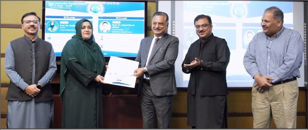 COMSATS University Islamabad Rector Prof. Dr. Raheel Qamar honours faculty members at the Best University Teacher Award 2025–26 ceremony in Islamabad.
