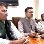 Mardan Division Commissioner Syed Muhammad Ali Shah addresses journalists at Mardan Press Club on development schemes, healthcare, traffic and encroachments.