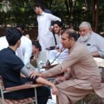 Islamia College students donate blood at a Hamza Foundation camp in Peshawar to support thalassemia and blood disorder patients.