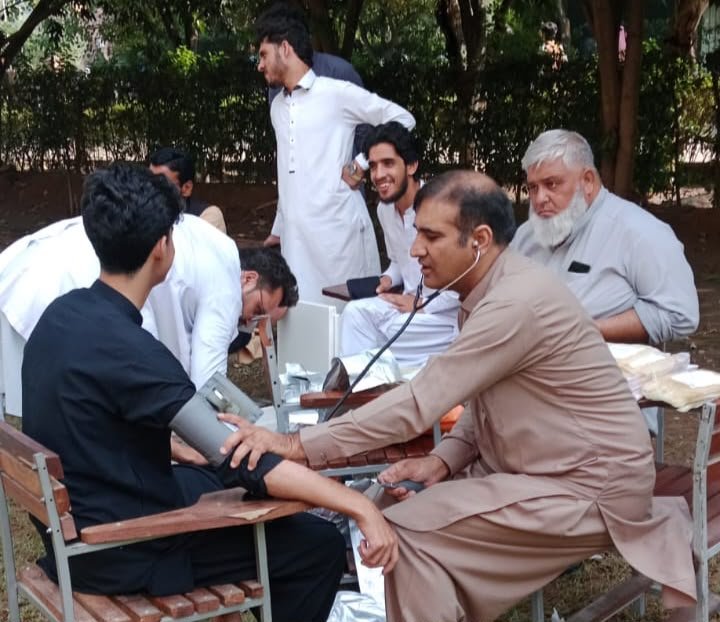 Islamia College students donate blood at a Hamza Foundation camp in Peshawar to support thalassemia and blood disorder patients.
