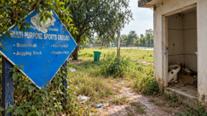Poorly maintained multi-purpose sports ground in Islamabad with litter, overgrown vegetation and damaged facilities under CDA civic management.