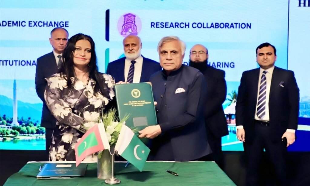 PMAS Arid Agriculture University Vice Chancellor Prof. Dr. Qamar-uz-Zaman and Maldives National University Vice Chancellor Dr. Aishath Shehenaz Adam sign an academic cooperation MoU at HEC Islamabad.