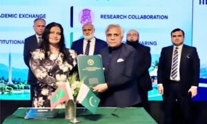 PMAS Arid Agriculture University Vice Chancellor Prof. Dr. Qamar-uz-Zaman and Maldives National University Vice Chancellor Dr. Aishath Shehenaz Adam sign an academic cooperation MoU at HEC Islamabad.