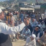 Traders and political leaders protest the proposed road widening in Rabat Bazaar, Lower Dir.