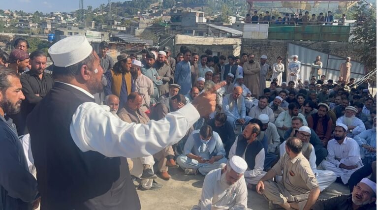 Traders and political leaders protest the proposed road widening in Rabat Bazaar, Lower Dir.