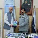 Saeed International Hospital and Islamabad Traffic Police officials sign a healthcare discount agreement.