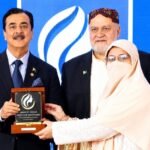 MPA Amna Sardar receives the Dukhtaran-e-Pakistan Award from Senate Chairman Yusuf Raza Gilani