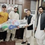 Mardan DC Shah Saud distributes sports kits among specially-abled athletes at Mardan Sports Complex.