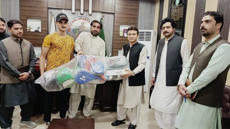 Mardan DC Shah Saud distributes sports kits among specially-abled athletes at Mardan Sports Complex.