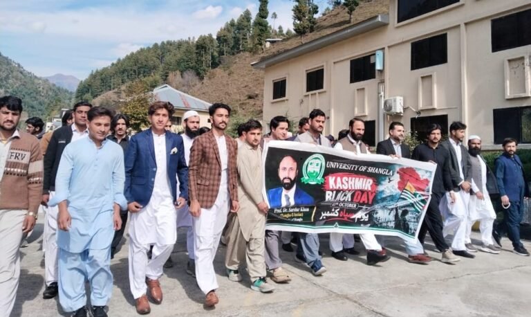 University of Shangla students participate in Kashmir Black Day awareness activities.