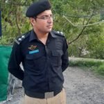 Police take Sub-Inspector Ahsan Khan into custody in connection with the Sardar Arif murder case in Abbottabad.