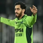 Arafat Minhas celebrates after his match-winning performance against England in an ODI match.