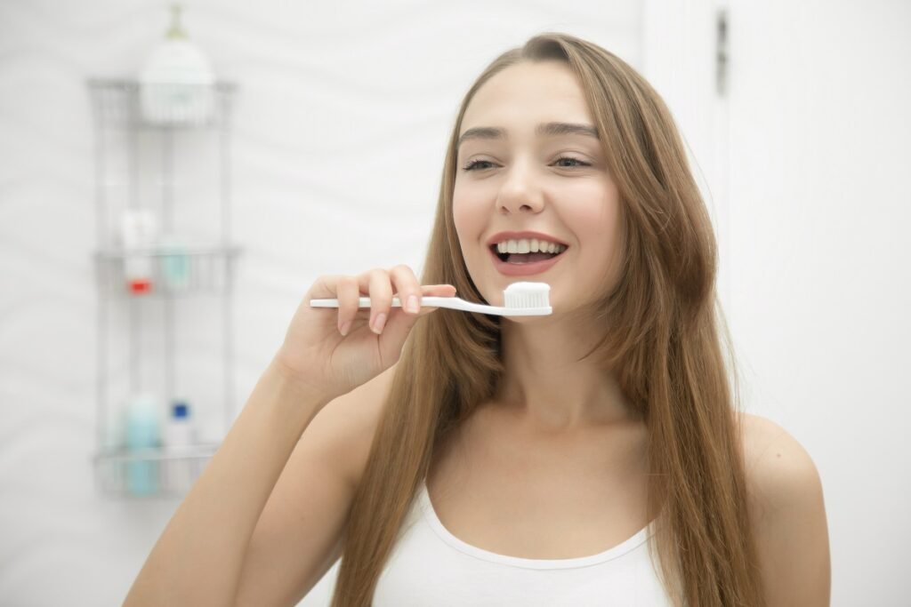 Brushing alone isn't enough Healthy teeth and gums illustration showing how vegetables, fruits and a balanced diet support oral health alongside regular brushing.