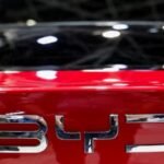 Chinese automaker BYD electric vehicle facing US military entry restrictions at Kadena Air Base in Okinawa, Japan, over security concerns.